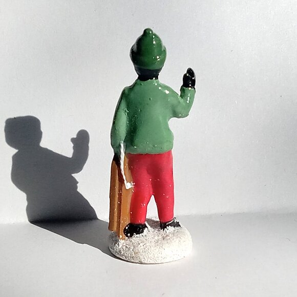 🎯 10 for $12 / Small Christmas Village Person holding Sled Figure - Picture 2 of 7